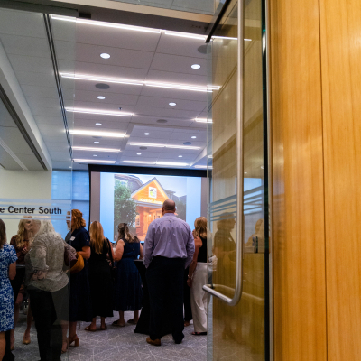 View through the doorway into the event room as guests gather