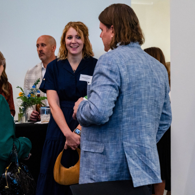Small group of guests chatting at the reception