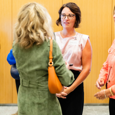 Two women talking during the networking reception